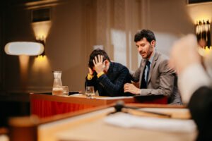 Courtroom simulation featuring a trial about artificial intelligence in Abu Dhabi events.