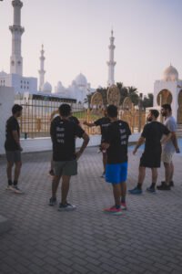 runners at flagpole Abu Dhabi community run outdoor fitness