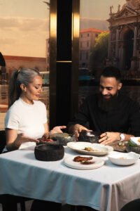 Luxury table setting for the Edible Art experience with Burj Khalifa views at Third Avenue Dubai