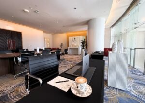 Professional laptop setup for coworking Dubai at Shangri-La Sheikh Zayed Road.