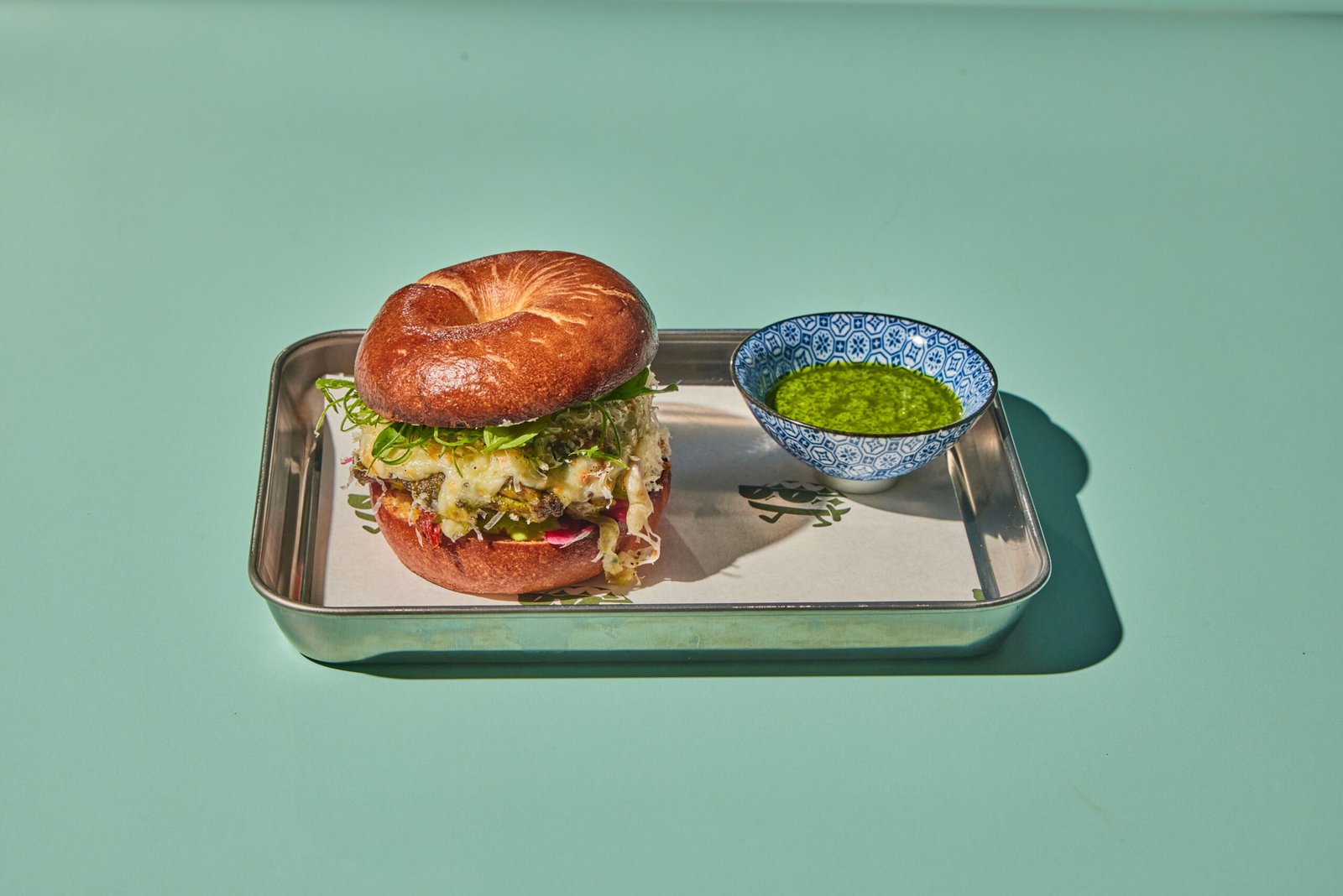 Selection of artisan baked goods and colorful schmears at 852 Bakery.