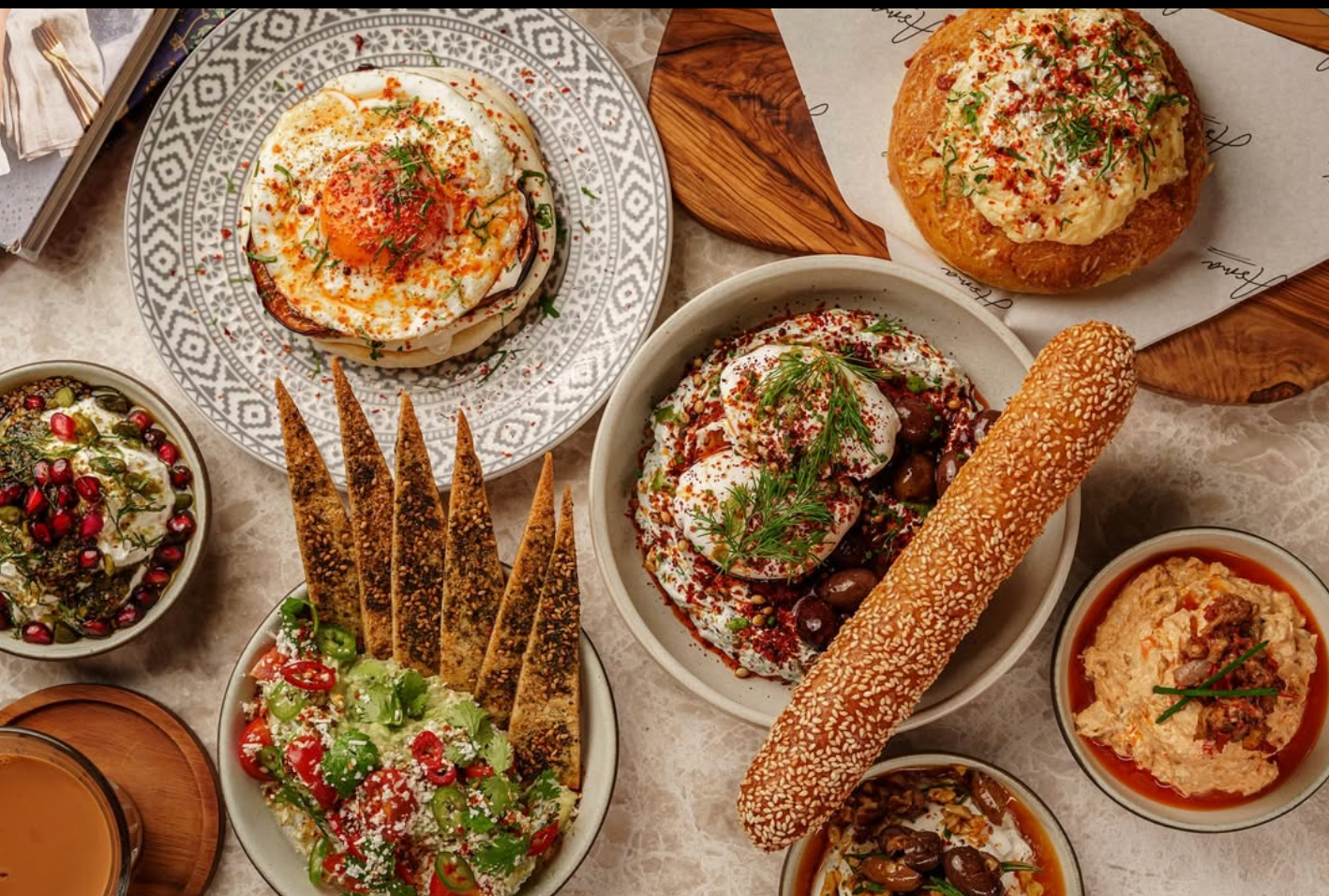 Vibrant sharing plates of a Middle Eastern brunch at Asma Dubai.