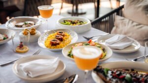 Fresh organic burrata appetizers served during the smart Lemon Week summer experience at a Mediterranean restaurant Dubai hotspot.
