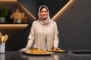 Chef Sumaya Obaid preparing traditional dishes on fresh Gulf cooking shows.