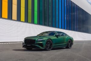 Spectral Verdant custom automotive finishes gleaming on a bespoke luxury cars body.
