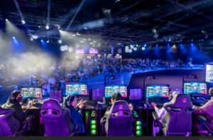 Passionate fans supporting Middle East female gamers at a live stadium match.